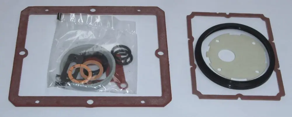 Dichtungs-Set mit verschiedenen O-Ringen und Dichtungen, verpackt in einer transparenten Tüte, neben einem Dichtungsring von Daikin.